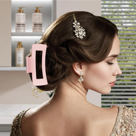 Woman using Yaqulen headband washing face demonstrating hands-free skincare