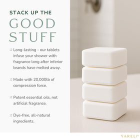 YARELI tablet in hand for scale showing compact size and travel convenience benefit