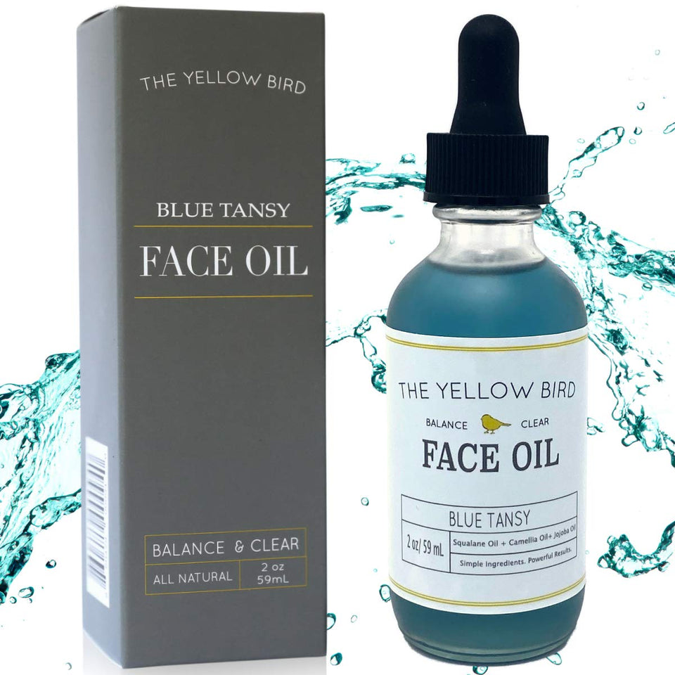 Yellow Bird front bottle showing label and calming blue oil benefit