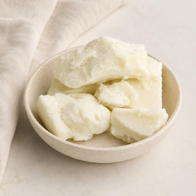 Yellow Brick Road shea butter in a DIY bathroom setup for small-batch skincare creation