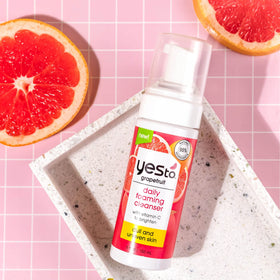Yes To grapefruit cleanser applied to face demonstrating removal benefit