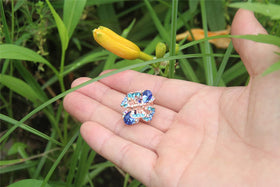 Yeshan butterfly silhouette profile highlighting delicate shape and shine