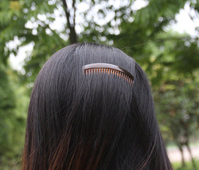 Yeshan decorated comb DIY example showing craft adaptability and custom looks