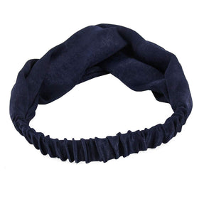 Yeshan headband worn by model in street outfit adding polished, comfortable flair