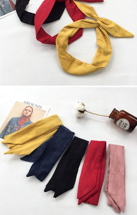 Yeshan ponytail tie detail illustrating decorative hold and reshapeability