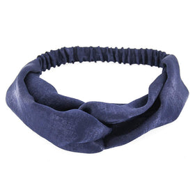 Yeshan headband next to ruler illustrating size and stretch for confident fit