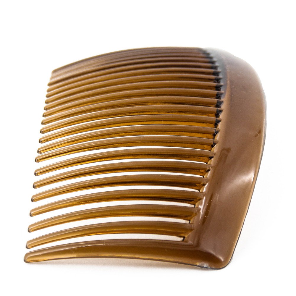 Yeshan comb held in hand showing size and easy portability for on-the-go styling