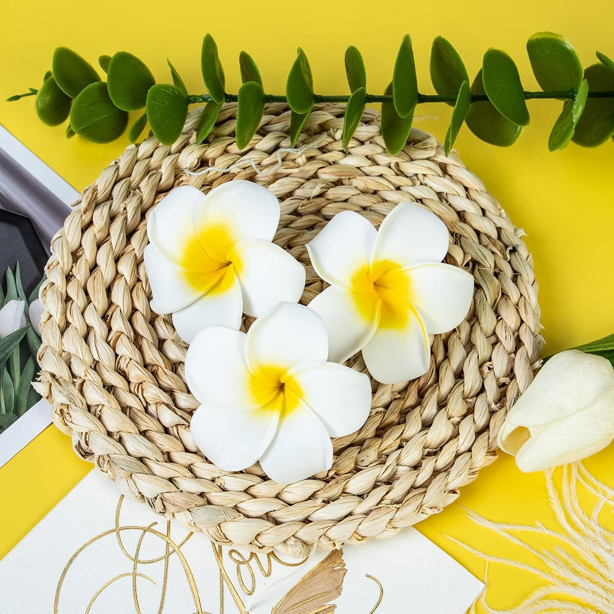 YHmall table with plumeria clips used as wedding luau decor adding festive accent