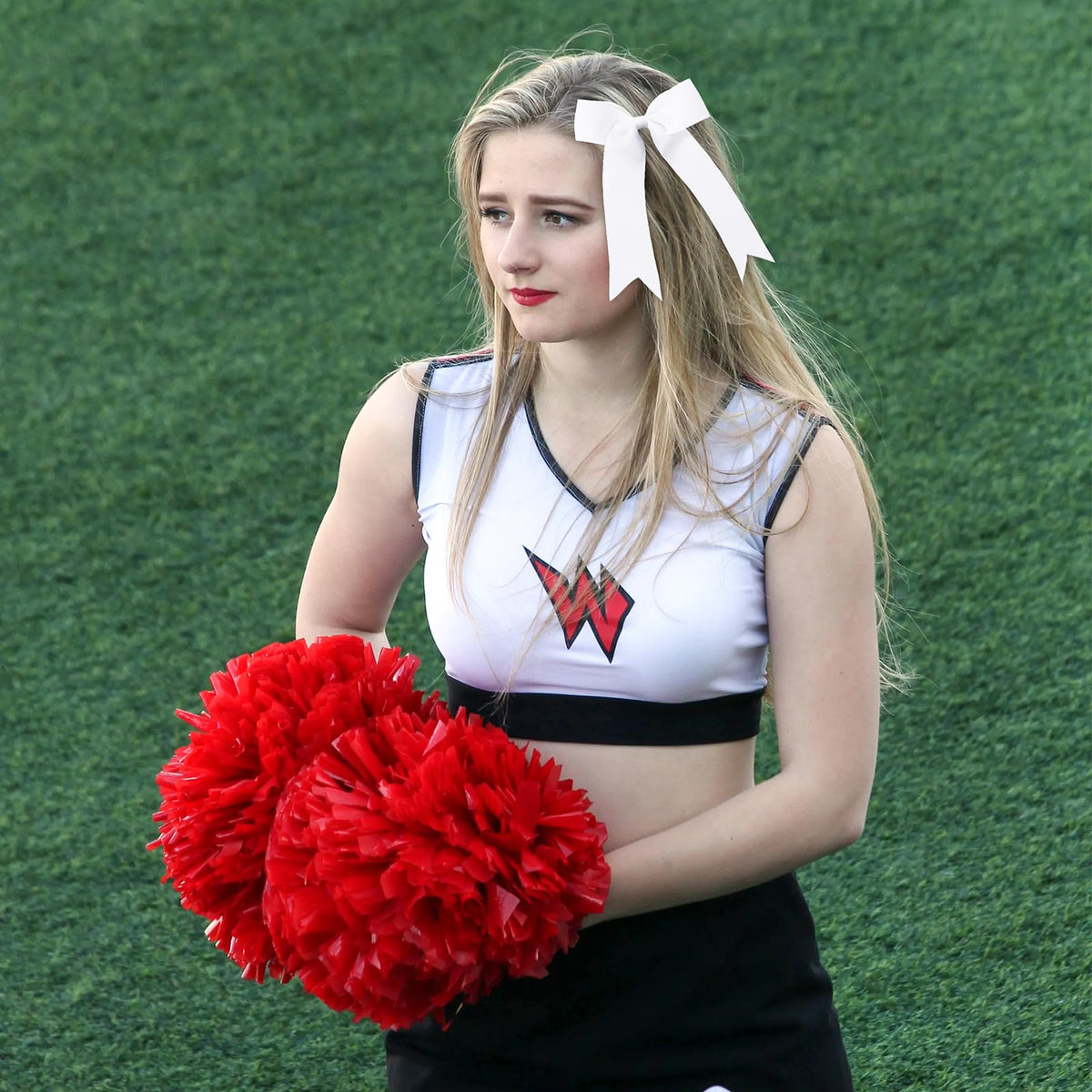 YHXX YLEN bow paired with school outfit showing spirit-ready styling