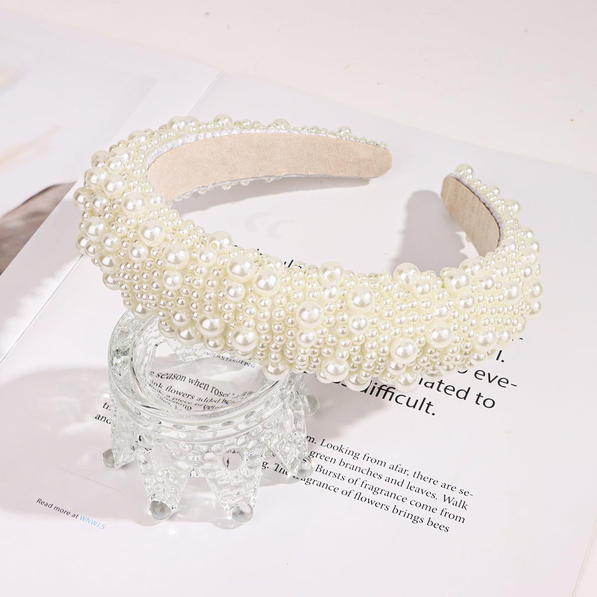 YISSION headband held in hand to show scale and lightweight design