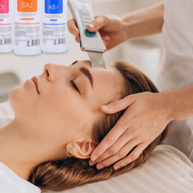 Esthetician using YMEYFAN solution during an aqua peeling facial for visible hydration