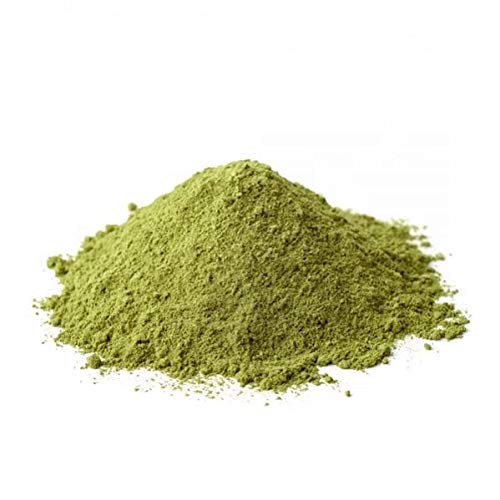 YOGI’S GIFT bhringraj powder mixed into a hair mask in bowl ready to apply