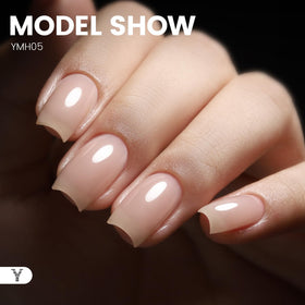 YOKE FELLOW cured nails on hands in lifestyle setting showcasing glossy finish