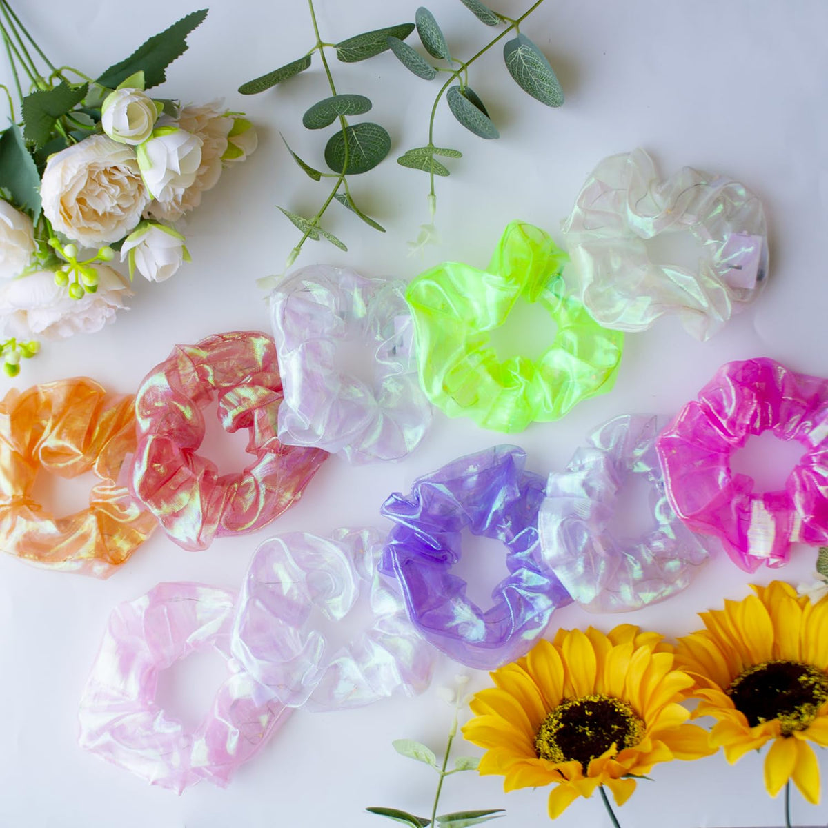 Yomwig scrunchies worn at a carnival-style party demonstrating eye-catching illumination