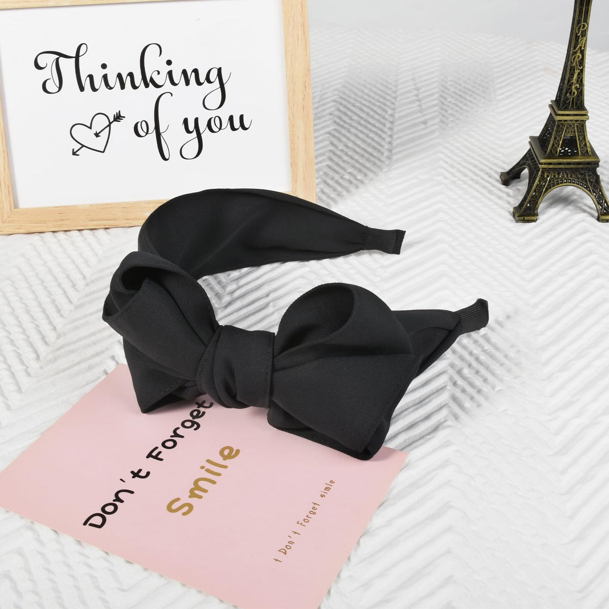 Yonchic holding hair in pony or bun for tidy, secure styling