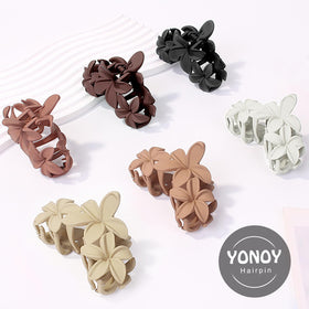 YONOY six clips laid out demonstrating color variety and styling options