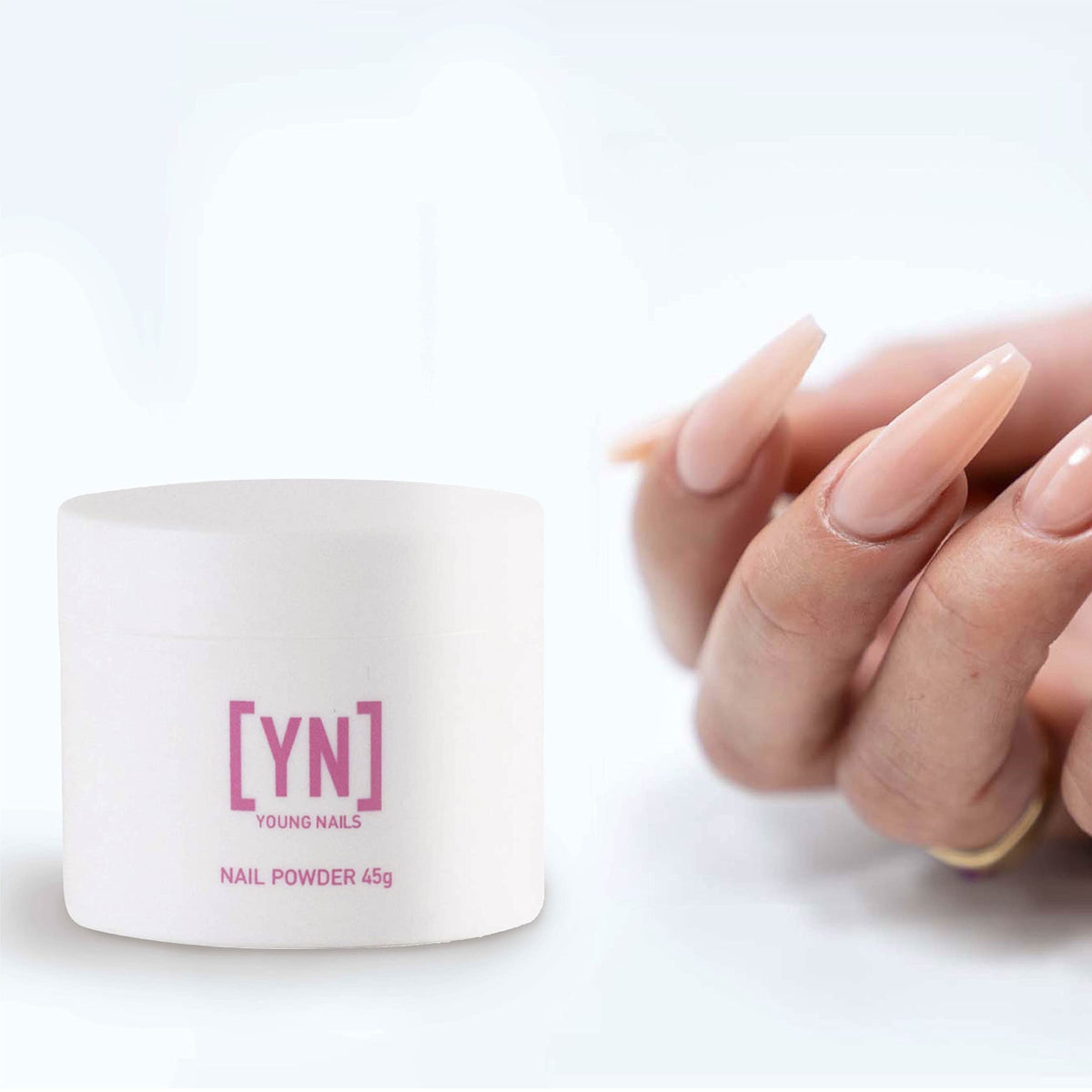 Young Nails 45g jar size scale beside coin for easy weight comparison