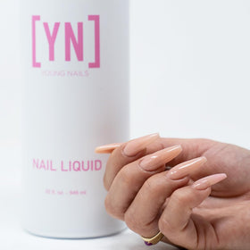 Young Nails bead on brush illustrating creamy self-leveling for precise sculpting