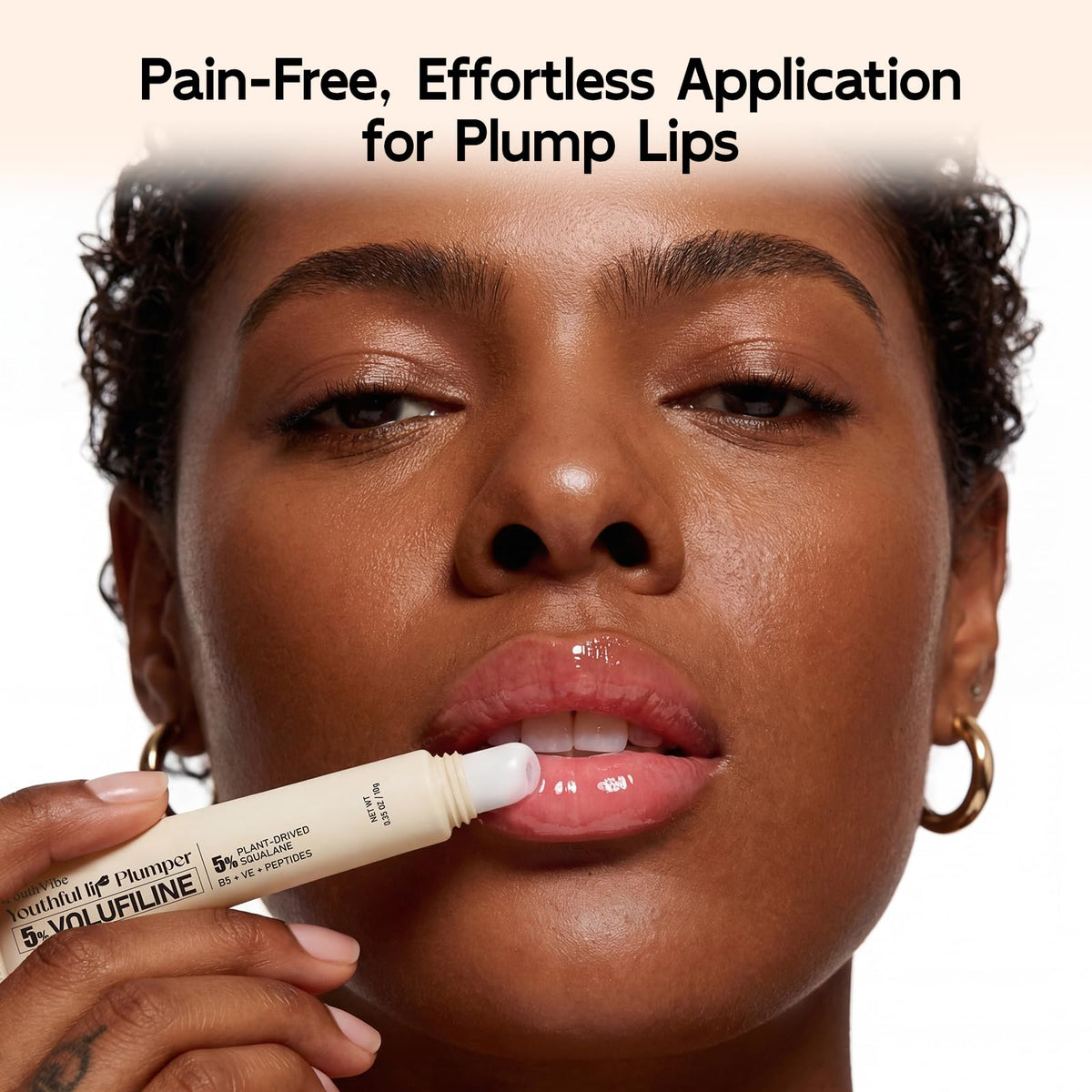YouthVibe applicator wand close-up demonstrating precise application and smooth coverage