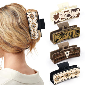 Yussti front view of four western claw clips showing all designs and secure hold benefit