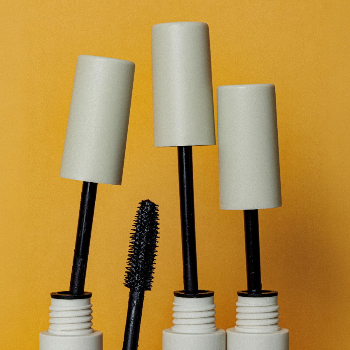 YuYa mascara open tube detail displaying wand and formula benefit
