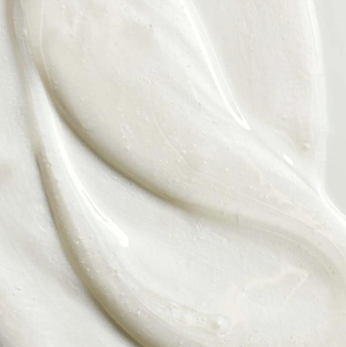 Yves Rocher shampoo pump and conditioner label close-up highlighting sulfate-free formula benefit
