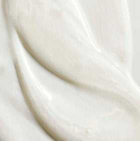 Yves Rocher shampoo pump and conditioner label close-up highlighting sulfate-free formula benefit