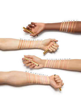 Yves Saint Laurent pen on a vanity to illustrate quick touch-ups and everyday elegance