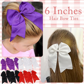 Yxiang bow worn in a high ponytail during cheer practice showing secure hold