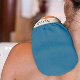 Zakia's Morocco mitt hanging on hook to dry illustrating simple care and hygienic storage