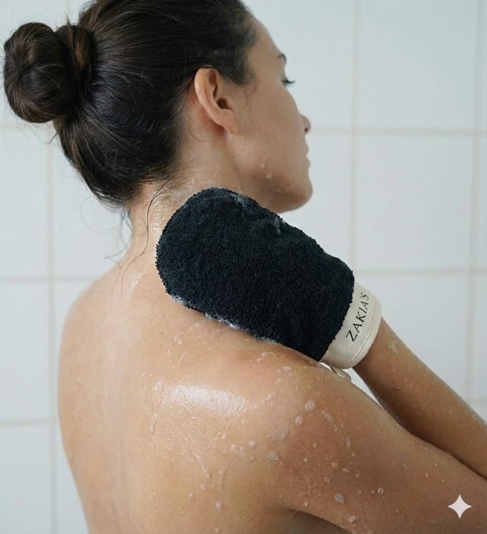 Zakia's Morocco mitt on hand demonstrating grip and control for effective exfoliation
