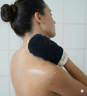 Zakia's Morocco mitt on hand demonstrating grip and control for effective exfoliation