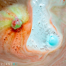ZenseMe unwrapping bath bomb with included scraper showing easy-open benefit