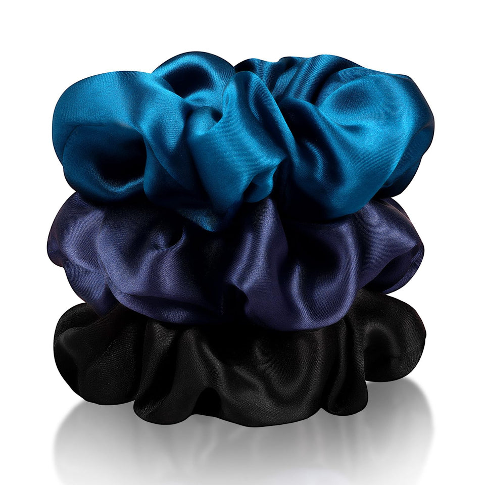 Zenssia front view showing three silk scrunchies and neat packaging, elegant accessory.