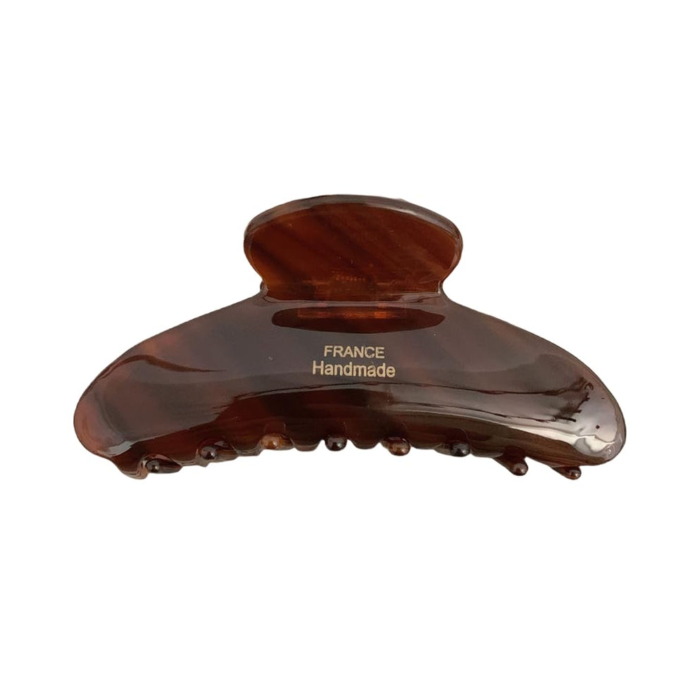 ZHOUMEIWENSP front view of caramel tortoise clip showing glossy finish and shape, stylish hold