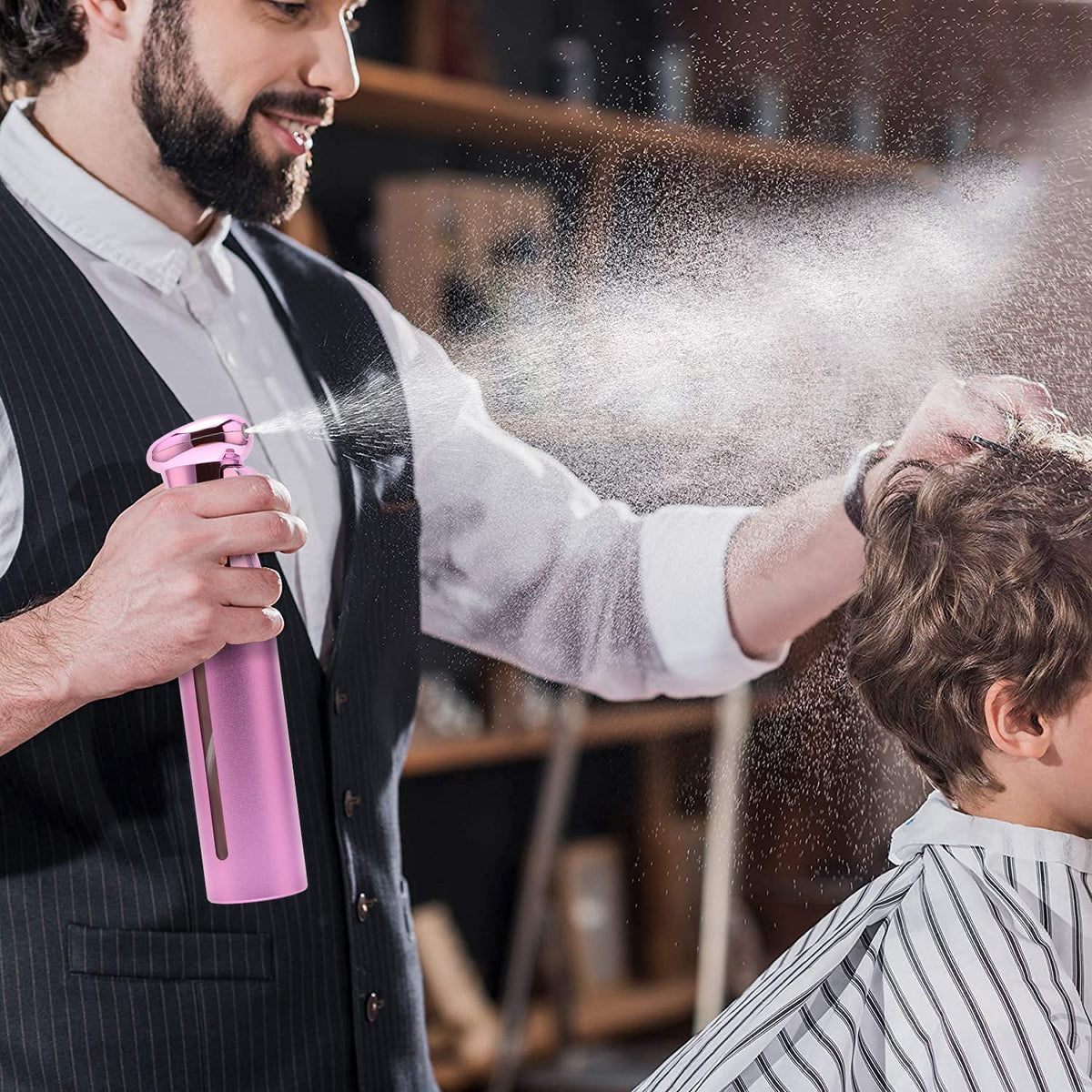 ZIBARBER misting houseplant leaves to provide gentle hydration and precise coverage