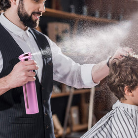 ZIBARBER misting houseplant leaves to provide gentle hydration and precise coverage