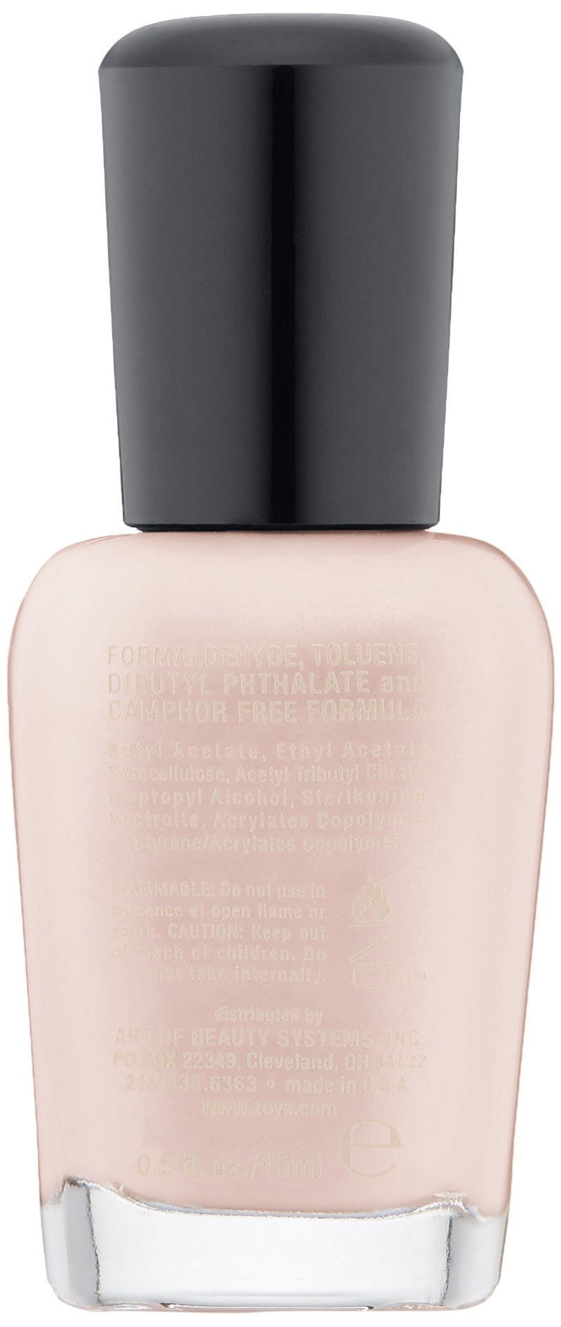 ZOYA Madison brush applying a smooth milky-cream stroke for even coverage
