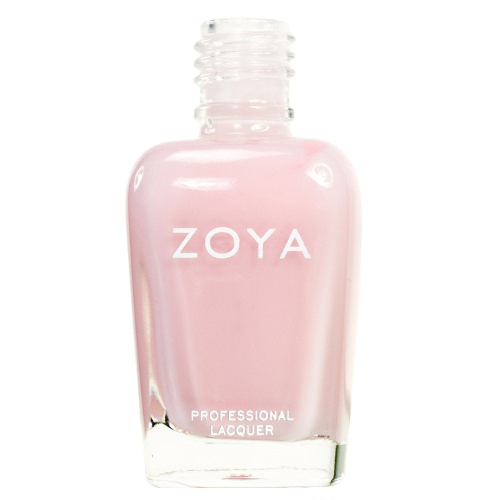 ZOYA Madison bottle on a vanity with manicure tools suggesting salon-ready finish