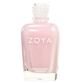 ZOYA Madison bottle on a vanity with manicure tools suggesting salon-ready finish