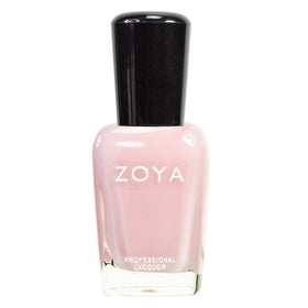 ZOYA Madison next to a ruler showing 0.5 fl oz bottle scale and portability