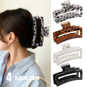 ZYTJ clip holding a long bun in use, reliable all-day hold benefit