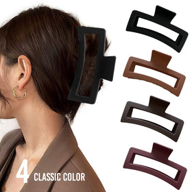 ZYTJ clip held in hand to show 5-inch jumbo scale for thick hair
