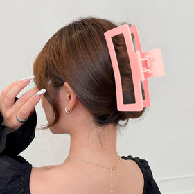 ZYTJ model wearing clip in full updo showing secure, comfortable hold